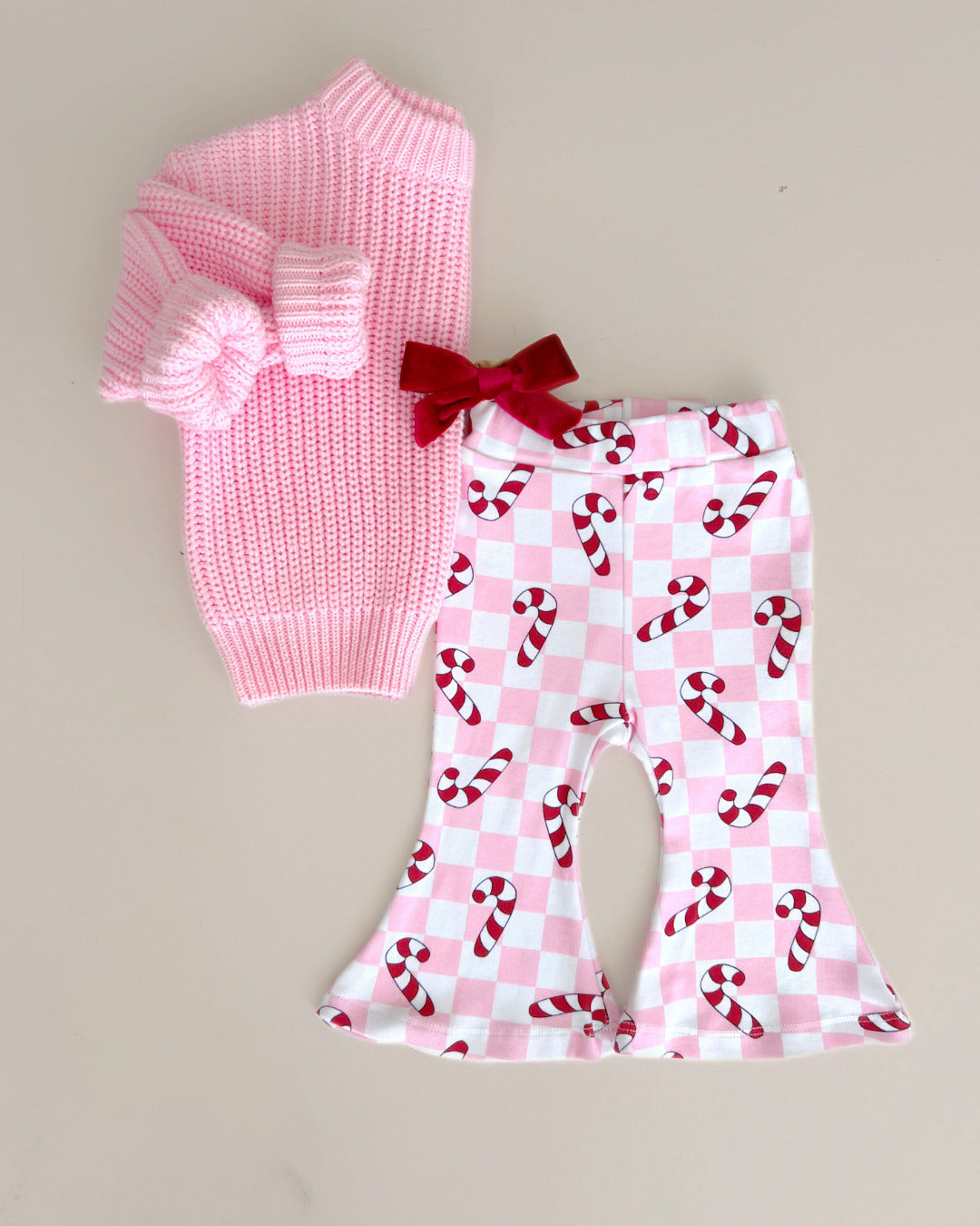 checkered candy cane flare pants // pink (available in extended sizing up to 8/9)