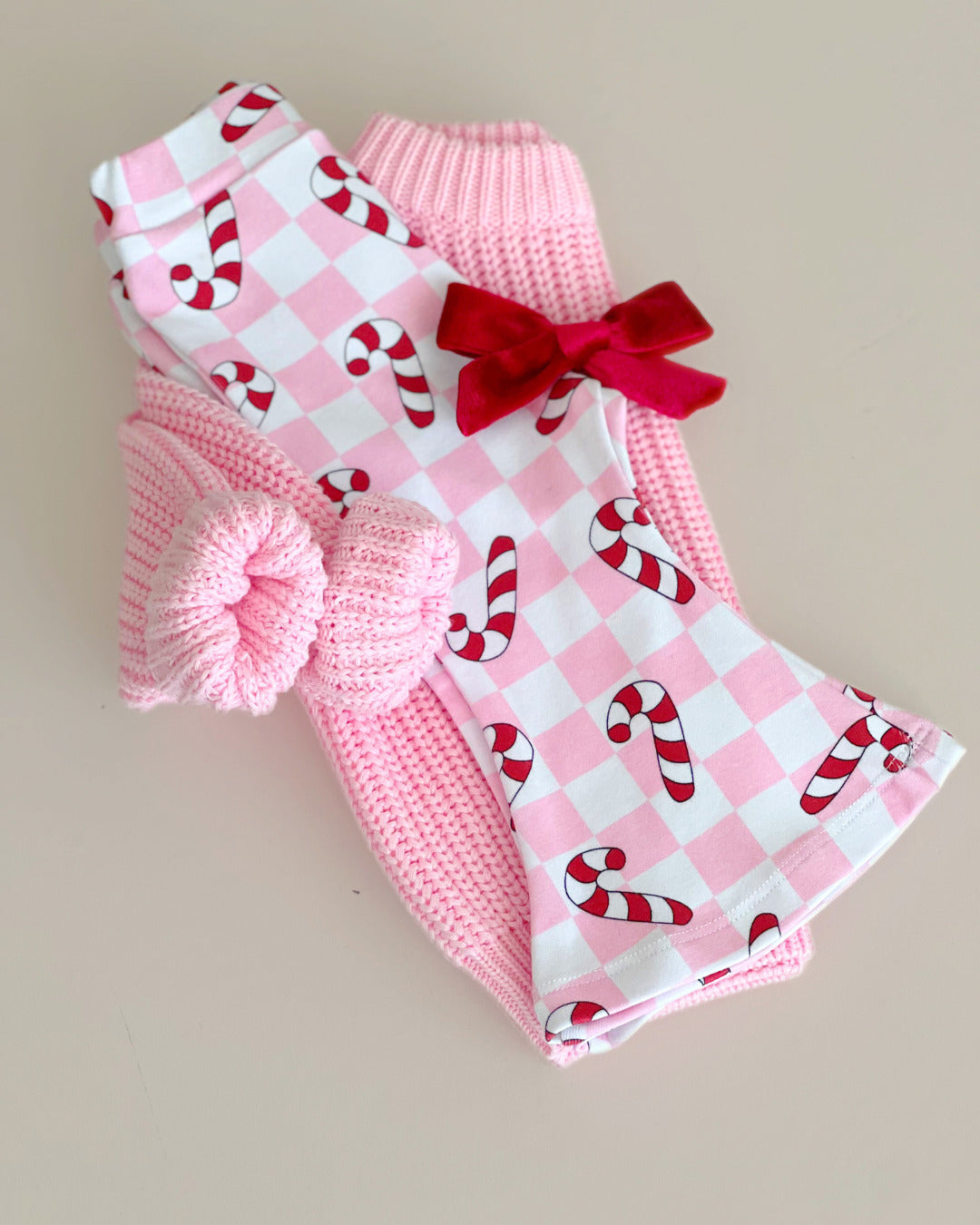 checkered candy cane flare pants // pink (available in extended sizing up to 8/9)