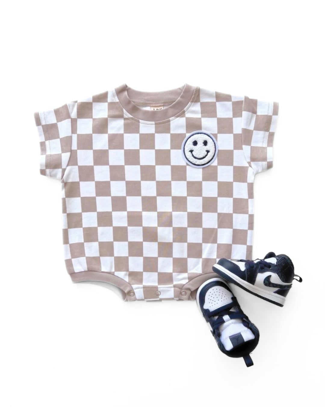 short sleeve bubble romper // checkered smiley latte