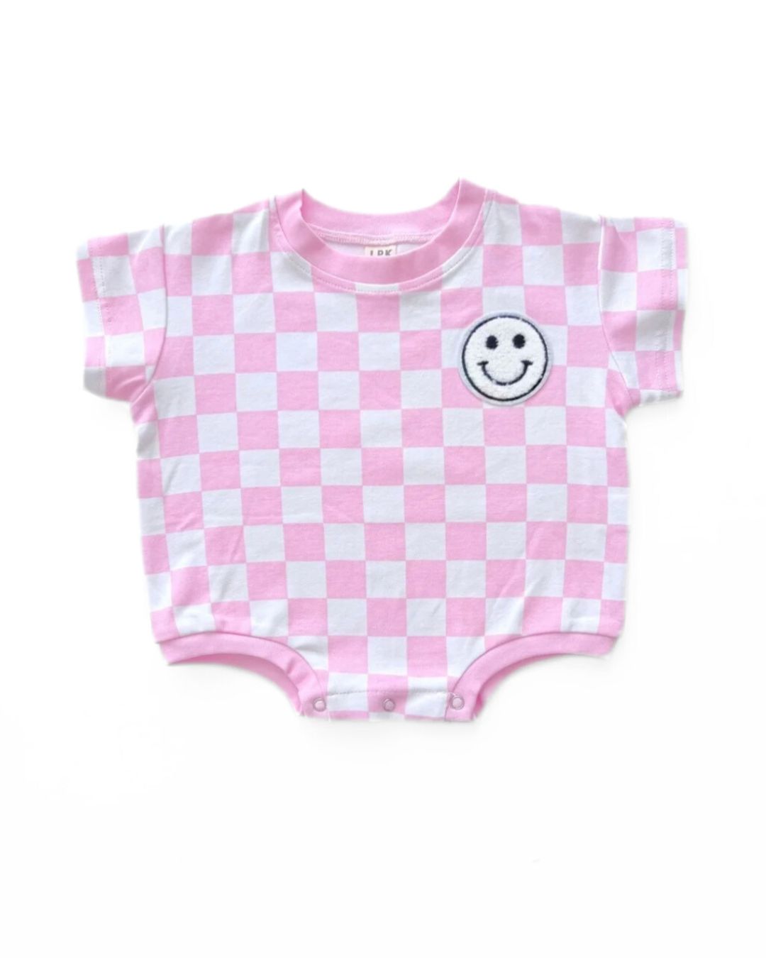 short sleeve bubble romper // checkered smiley pink