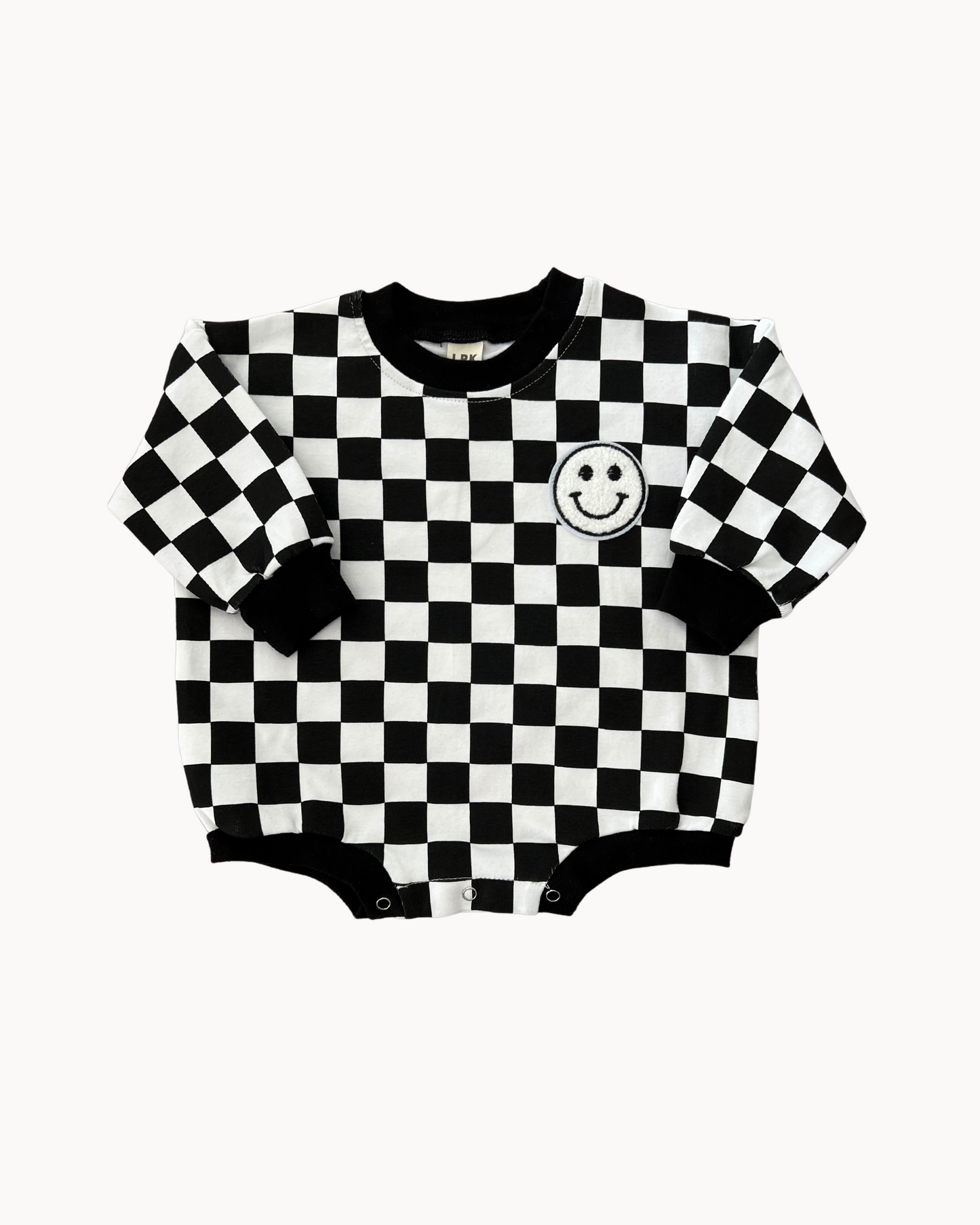 bubble romper // checkered smiley black