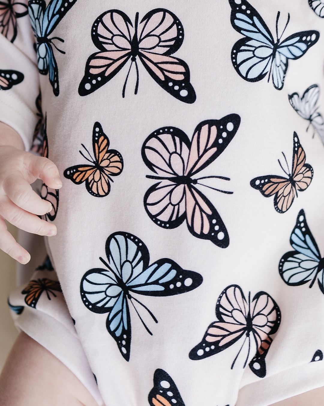 short sleeve bubble romper // butterflies