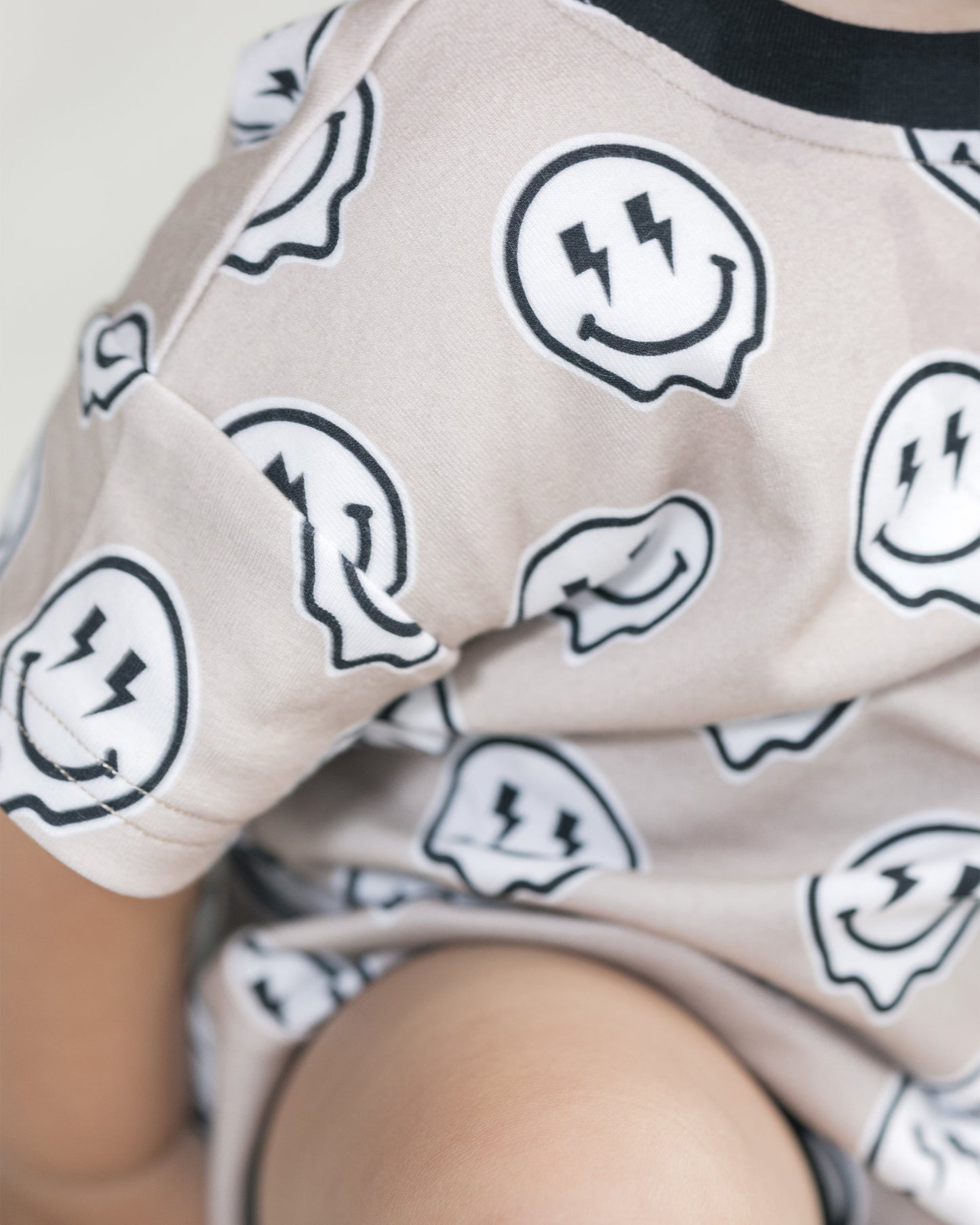 short sleeve bubble romper // electric drippy smiley