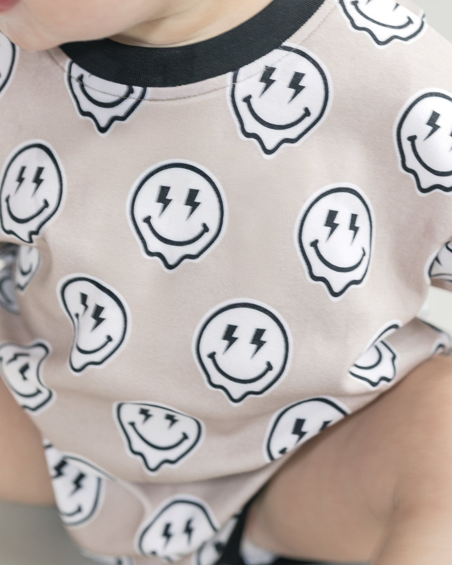 short sleeve bubble romper // electric drippy smiley