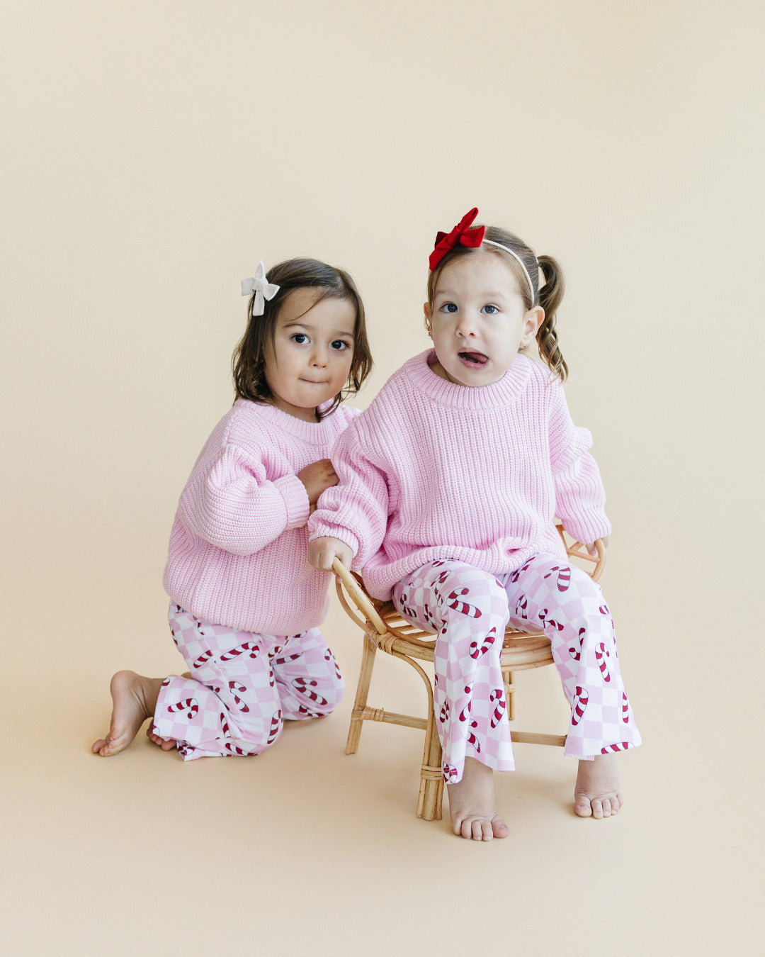 checkered candy cane flare pants // pink (available in extended sizing up to 8/9)
