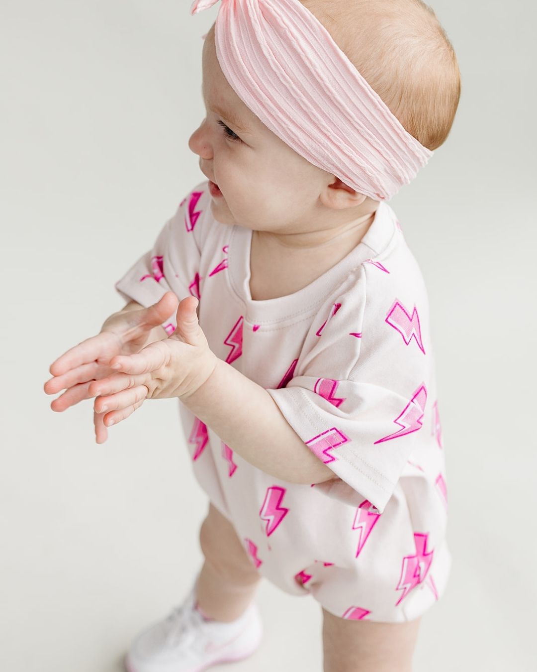 short sleeve bubble romper // pink lightning bolts