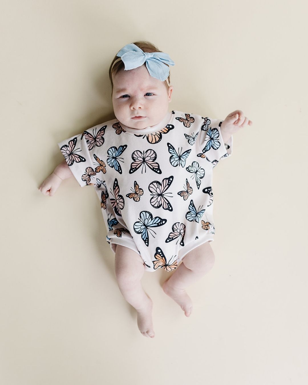 short sleeve bubble romper // butterflies