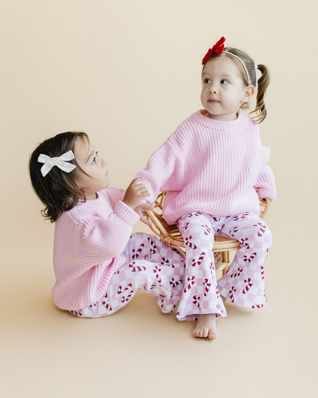 checkered candy cane flare pants // pink (available in extended sizing up to 8/9)