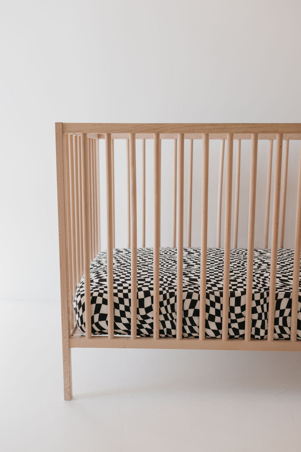 muslin crib sheet // black + white wavy checkerboard