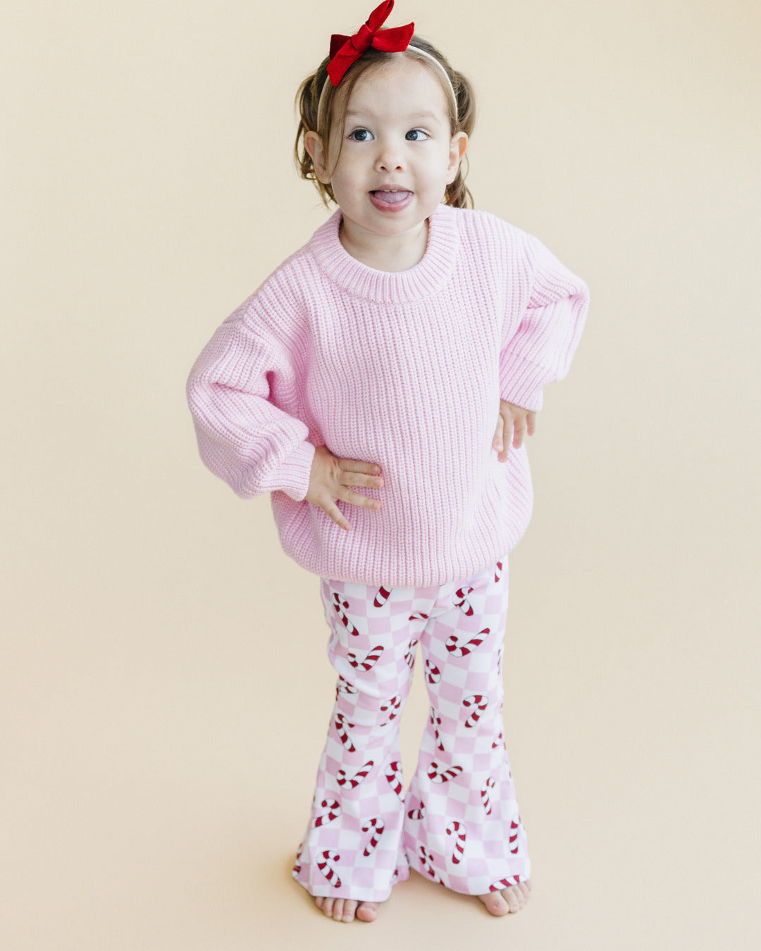 checkered candy cane flare pants // pink (available in extended sizing up to 8/9)