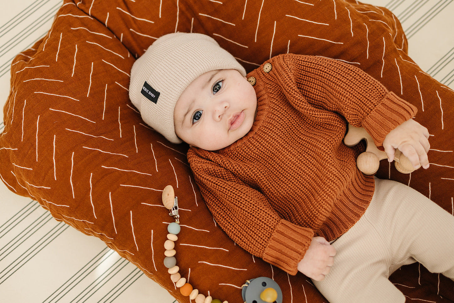 muslin swaddle blanket // rust mudcloth
