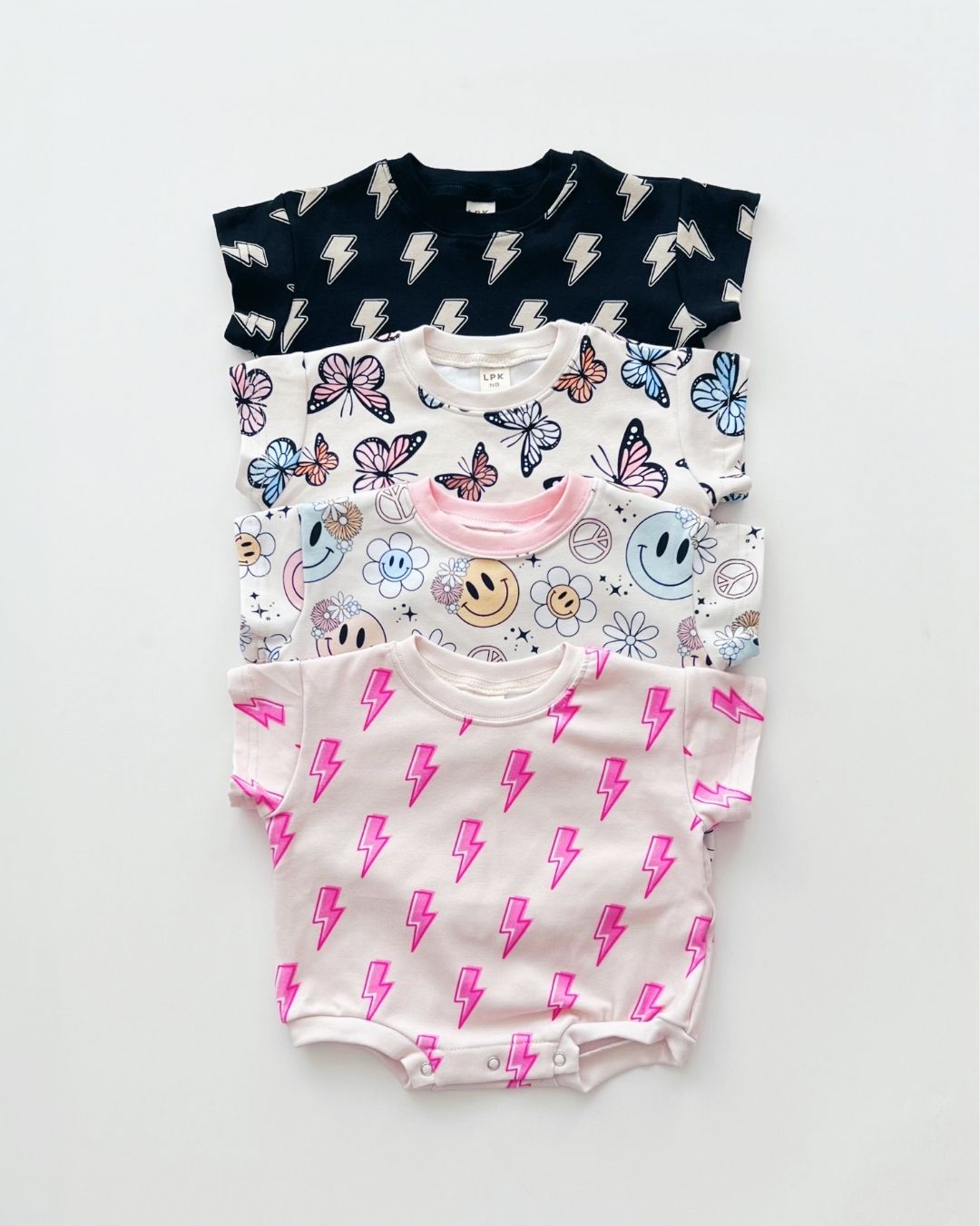 short sleeve bubble romper // pink lightning bolts