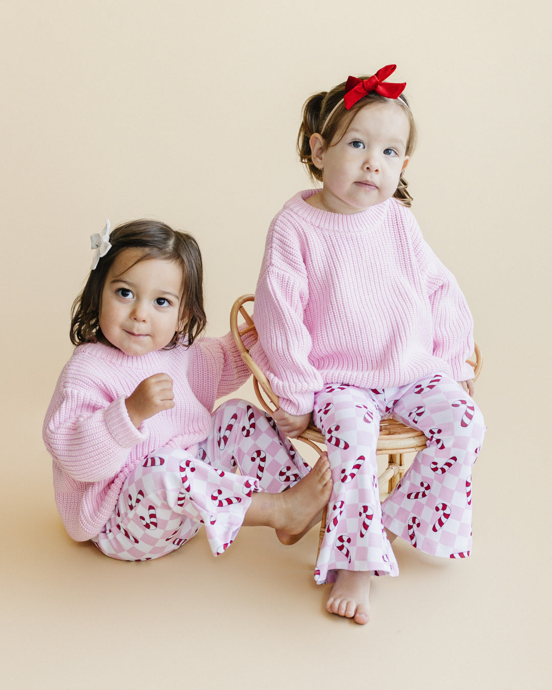 checkered candy cane flare pants // pink (available in extended sizing up to 8/9)