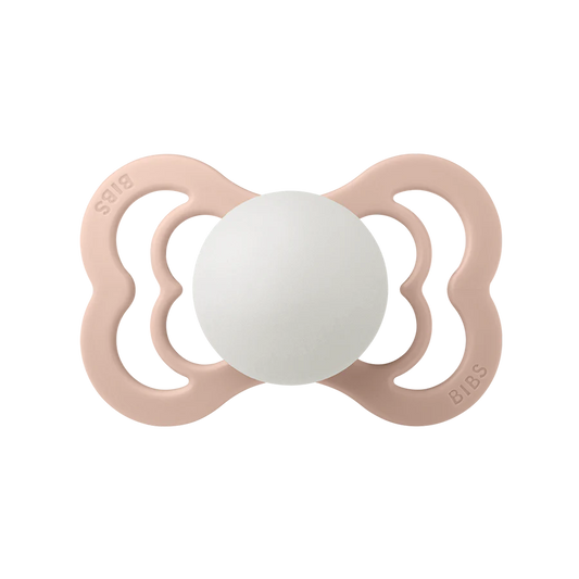 BIBS supreme GLOW pacifier // symmetrical silicone nipple // blush GLOW
