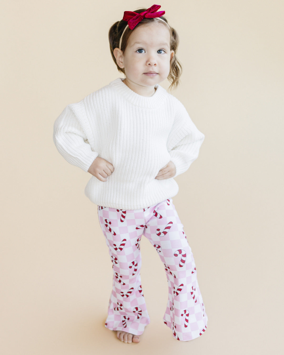 checkered candy cane flare pants // pink (available in extended sizing up to 8/9)