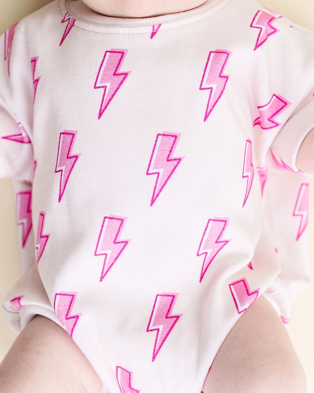 short sleeve bubble romper // pink lightning bolts