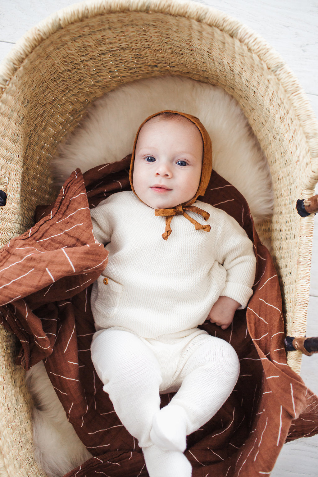 muslin swaddle blanket // rust mudcloth