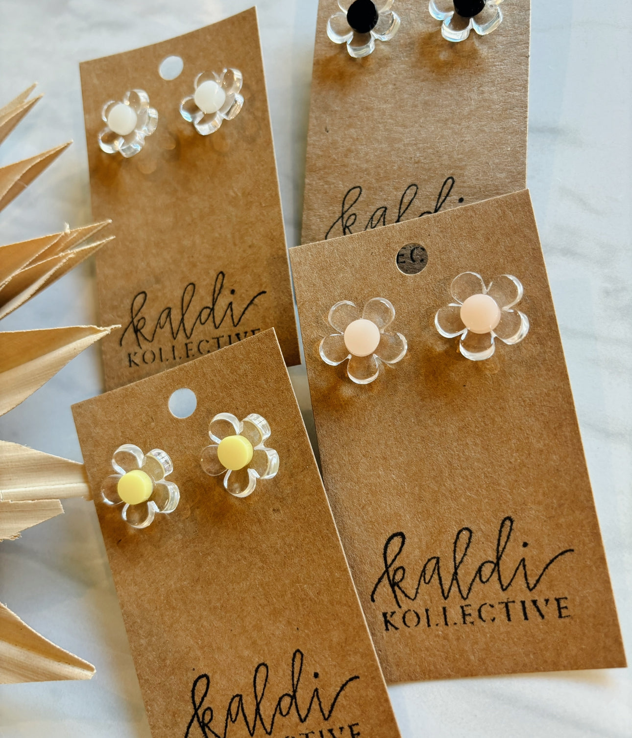 clear daisy studs