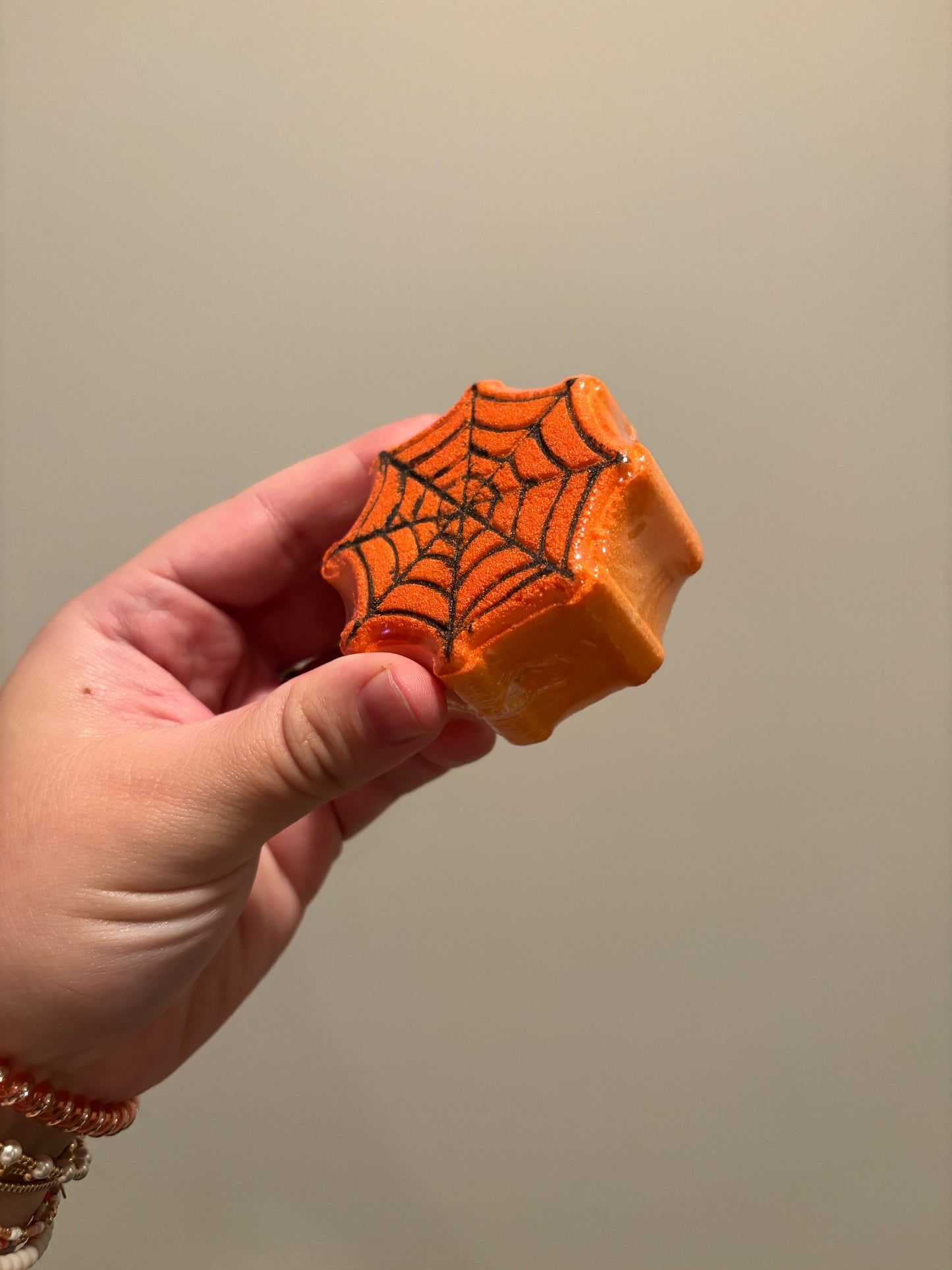 orange spider web bath bomb
