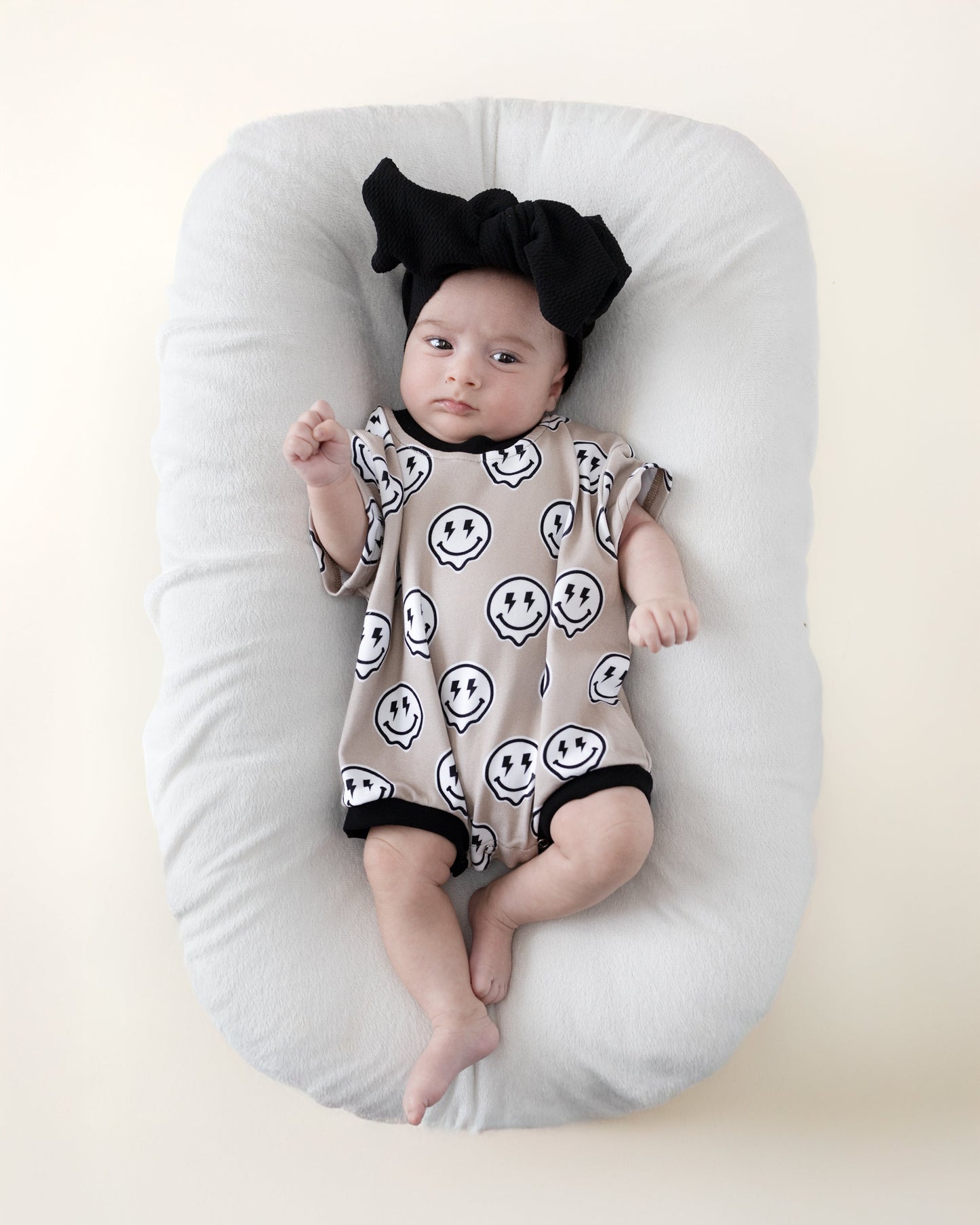short sleeve bubble romper // electric drippy smiley