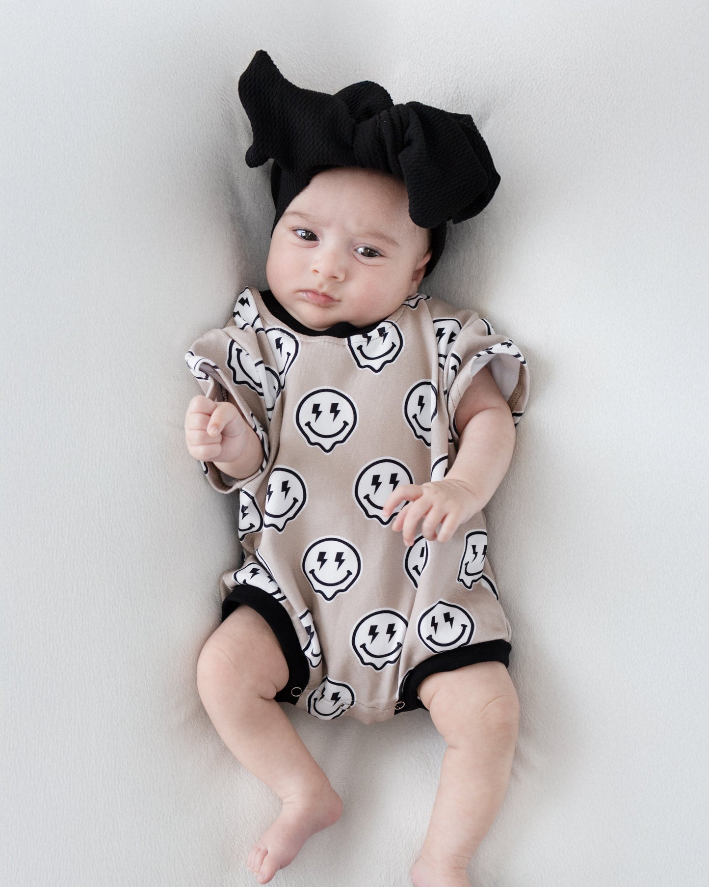 short sleeve bubble romper // electric drippy smiley