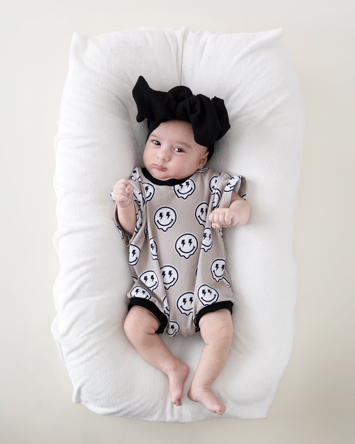 short sleeve bubble romper // electric drippy smiley