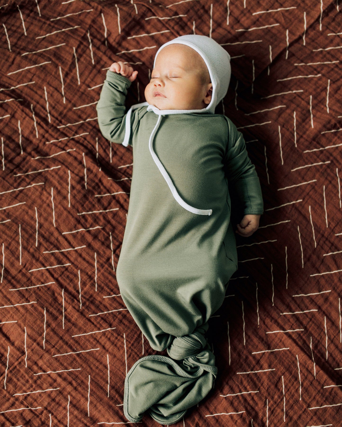 muslin swaddle blanket // rust mudcloth