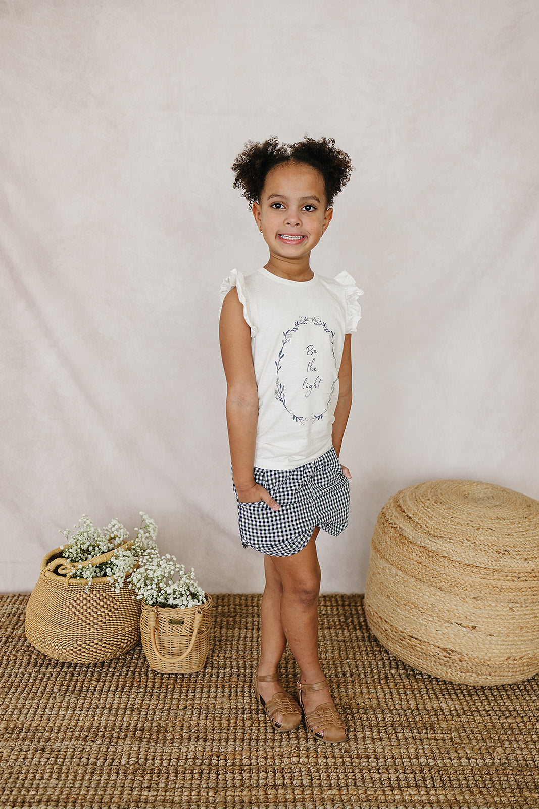 be the light ruffle tee