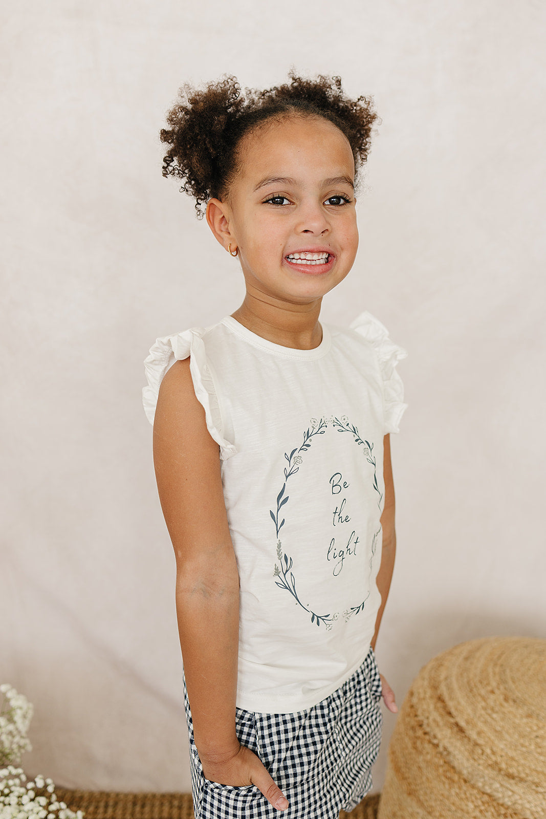 be the light ruffle tee