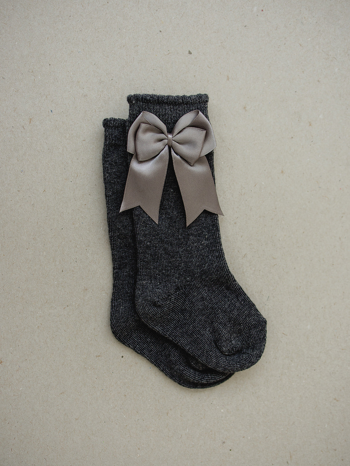 high-rise bow socks