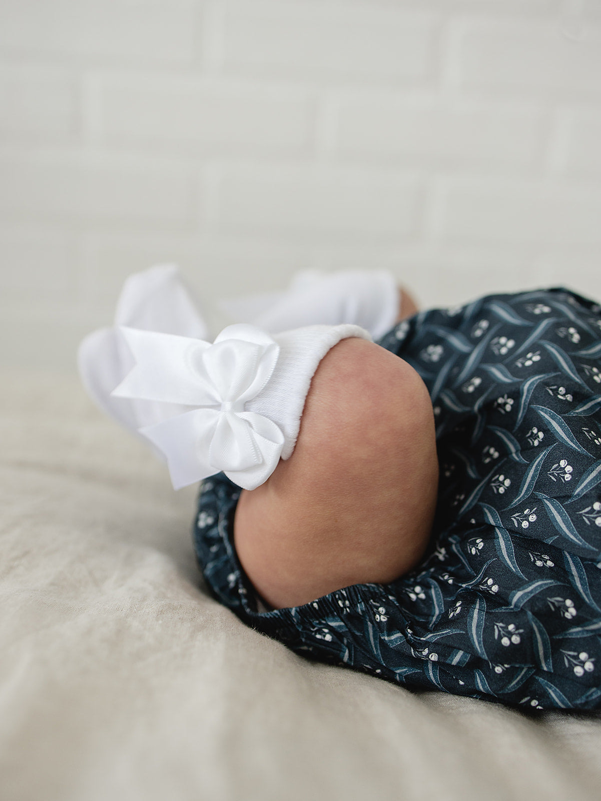 high-rise bow socks