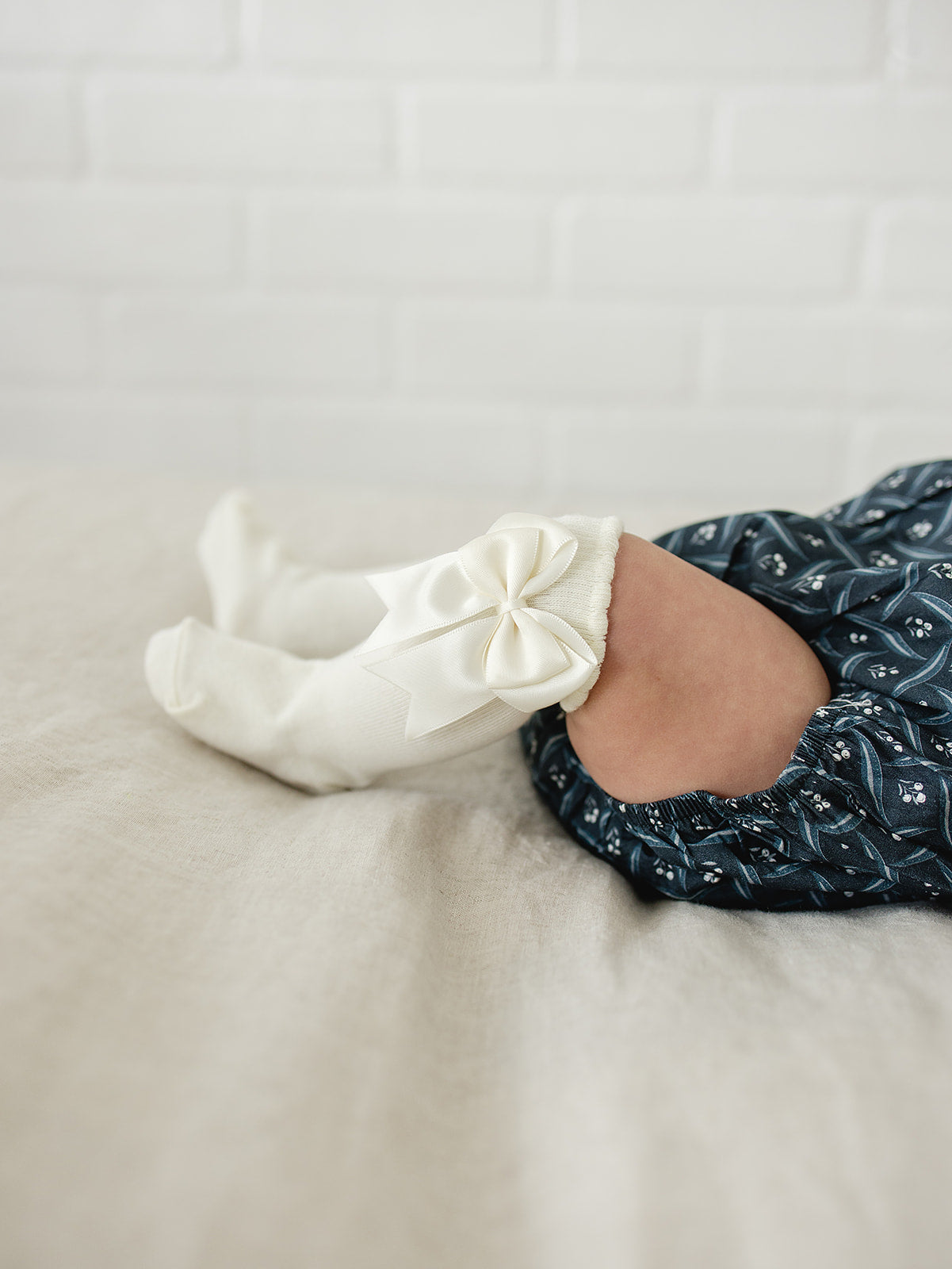 high-rise bow socks