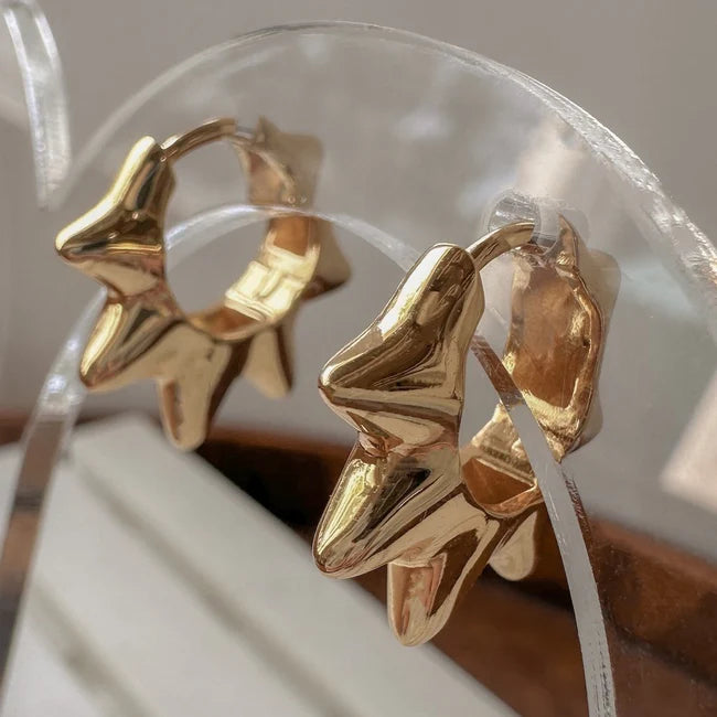edgy elegance gold huggie hoop earrings