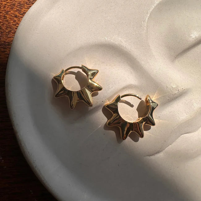edgy elegance gold huggie hoop earrings