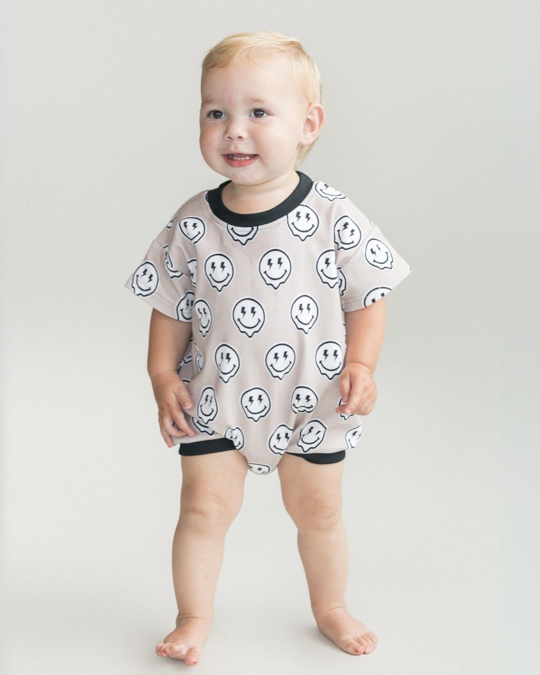 short sleeve bubble romper // electric drippy smiley