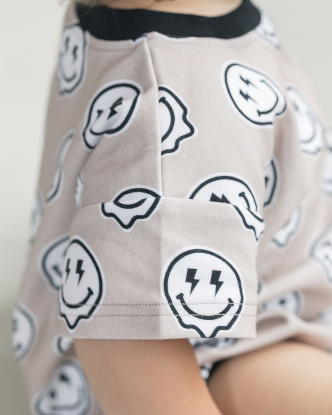 short sleeve bubble romper // electric drippy smiley
