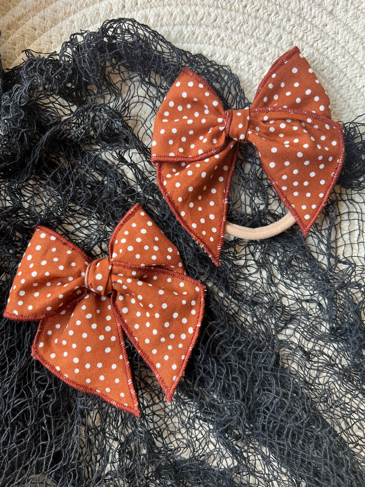 burnt orange dotted bow