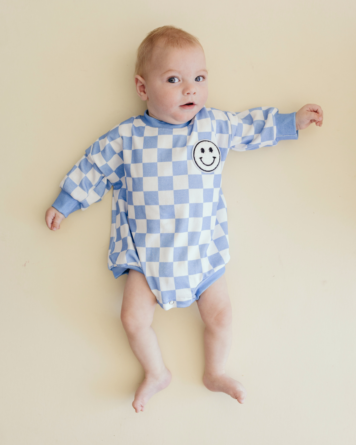 bubble romper // checkered smiley blue