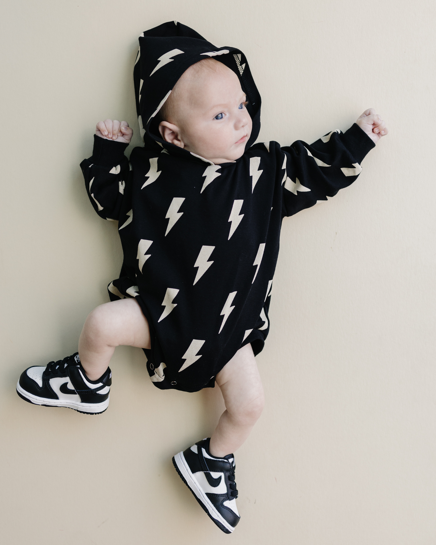 hooded bubble romper // black bolts