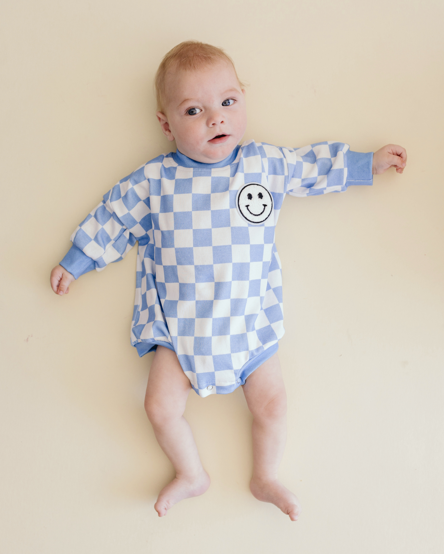 bubble romper // checkered smiley blue