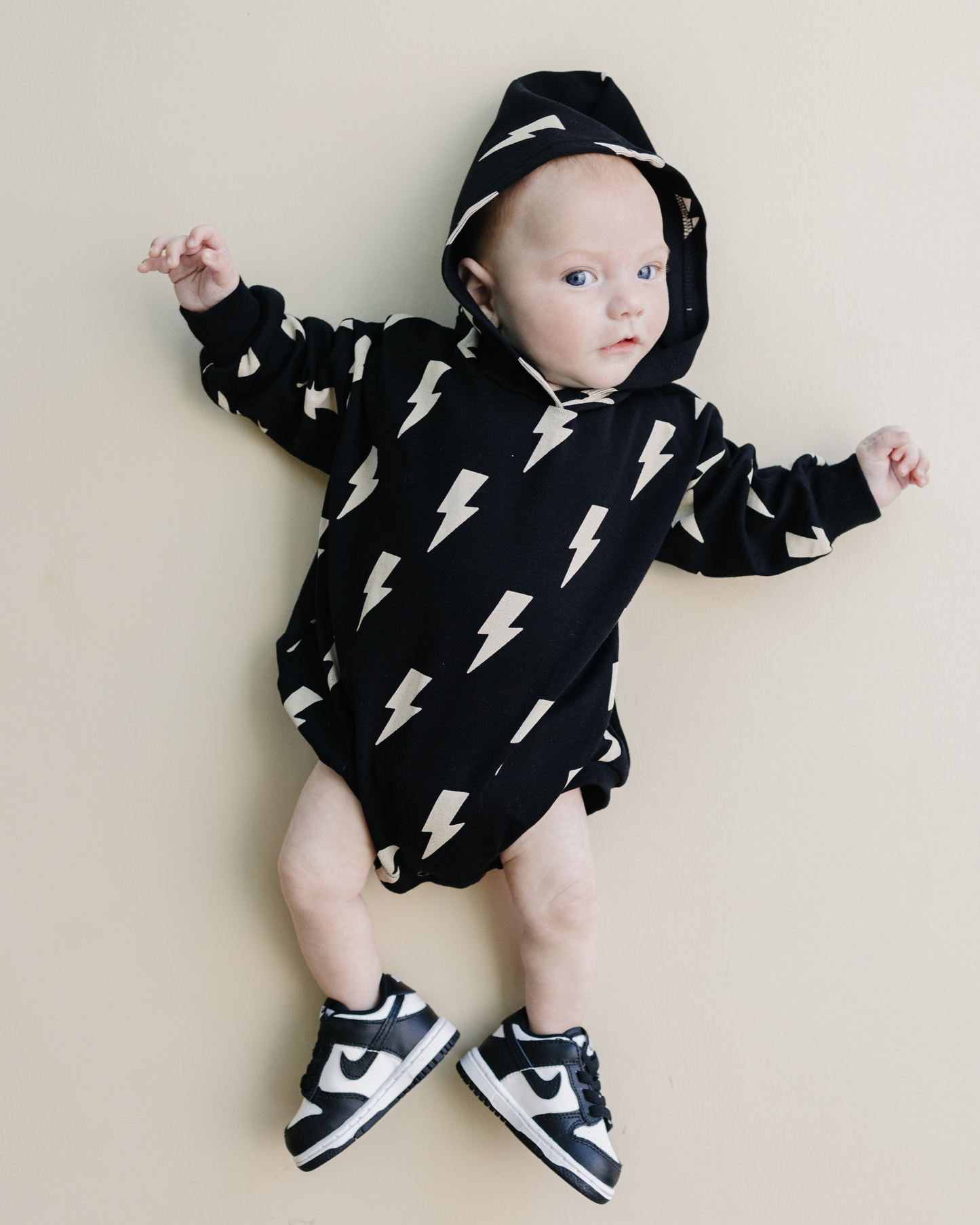 hooded bubble romper // black bolts