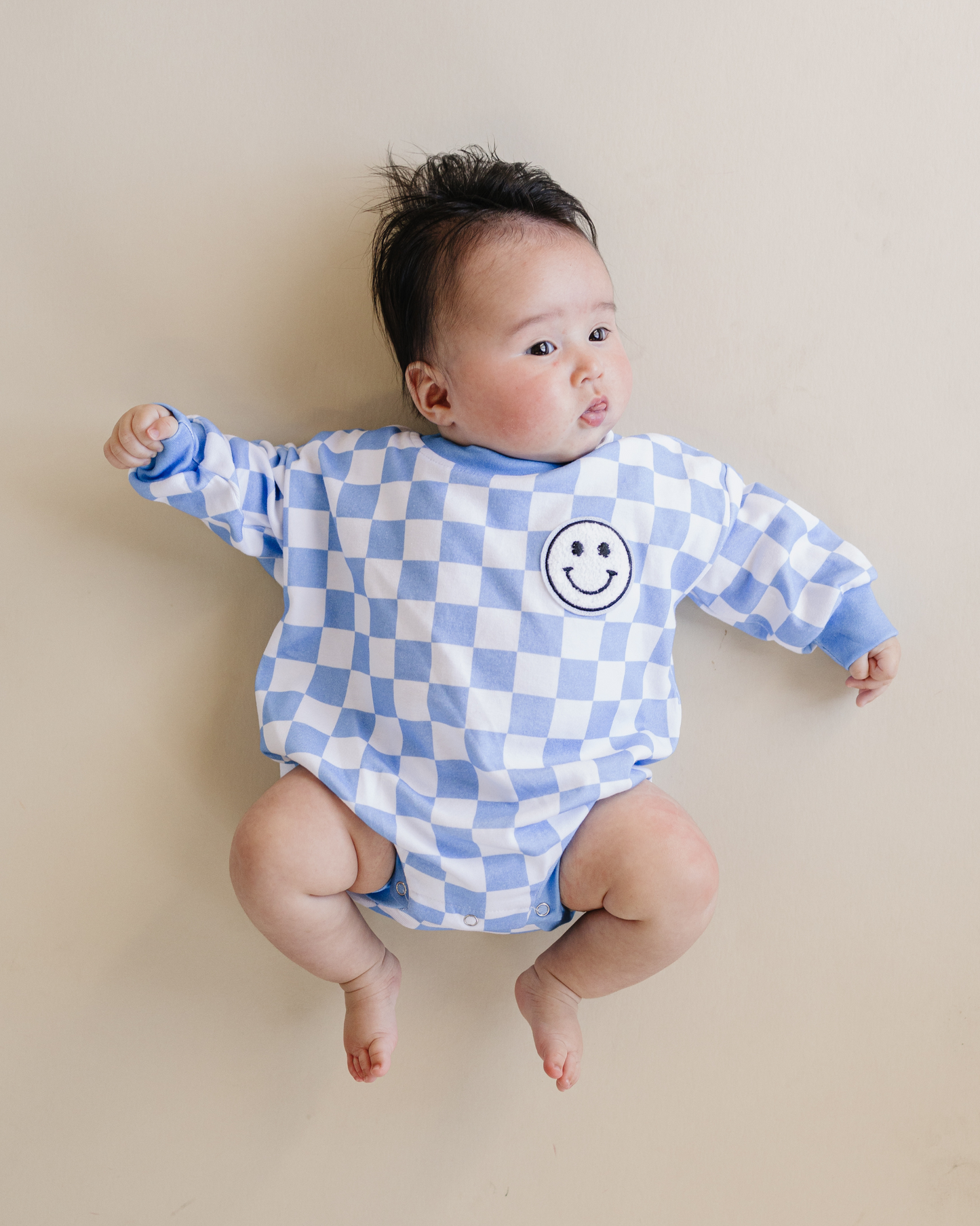 bubble romper // checkered smiley blue