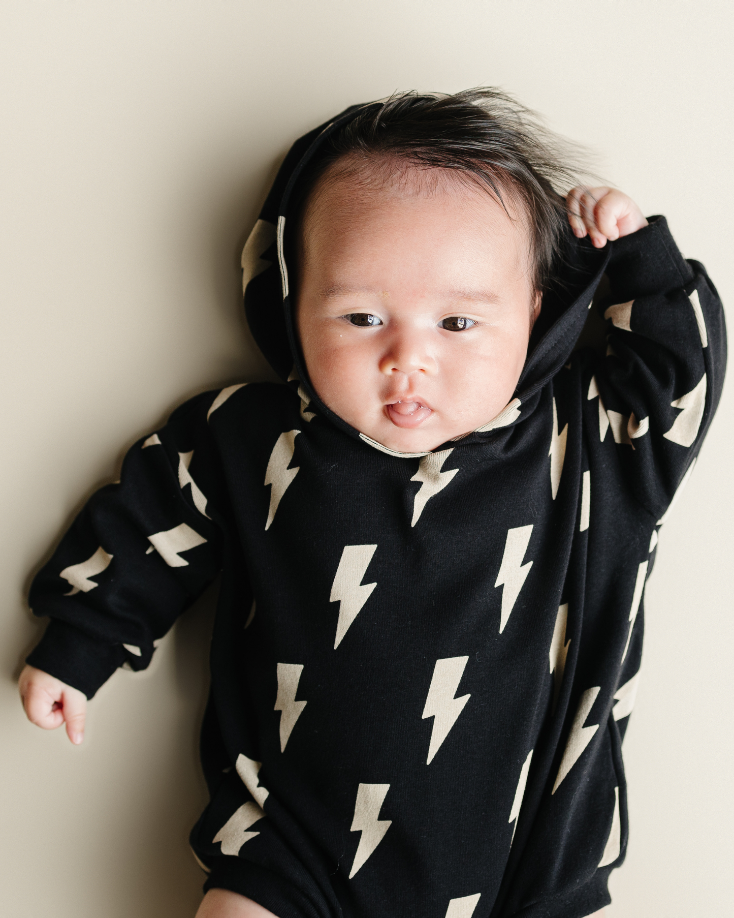 hooded bubble romper // black bolts