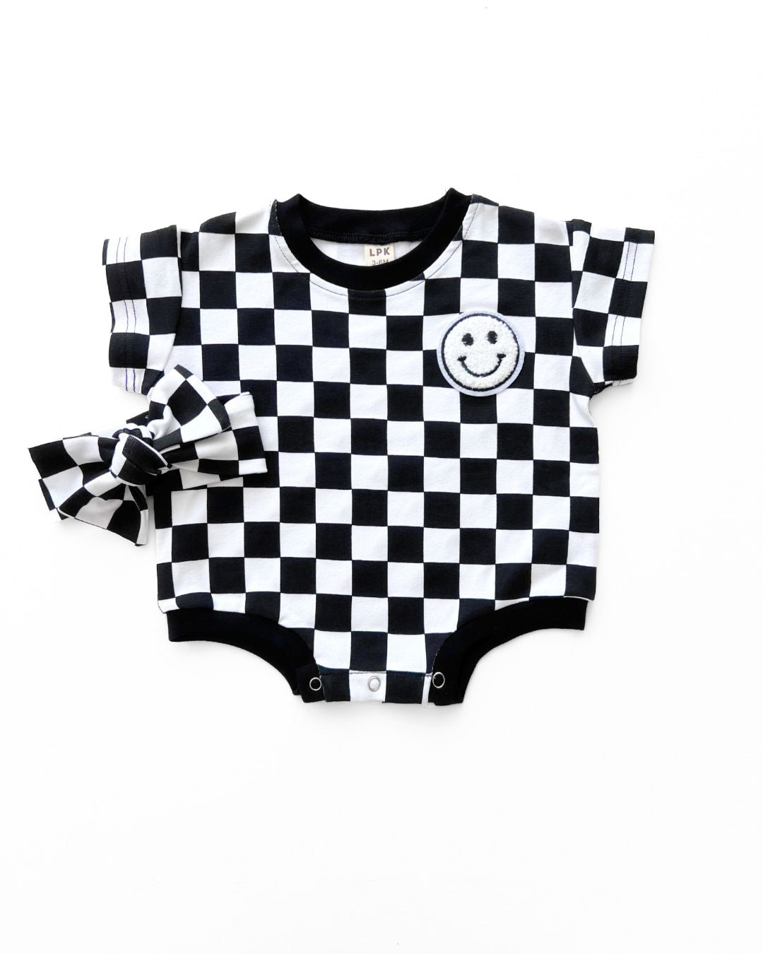 short sleeve bubble romper // checkered smiley black