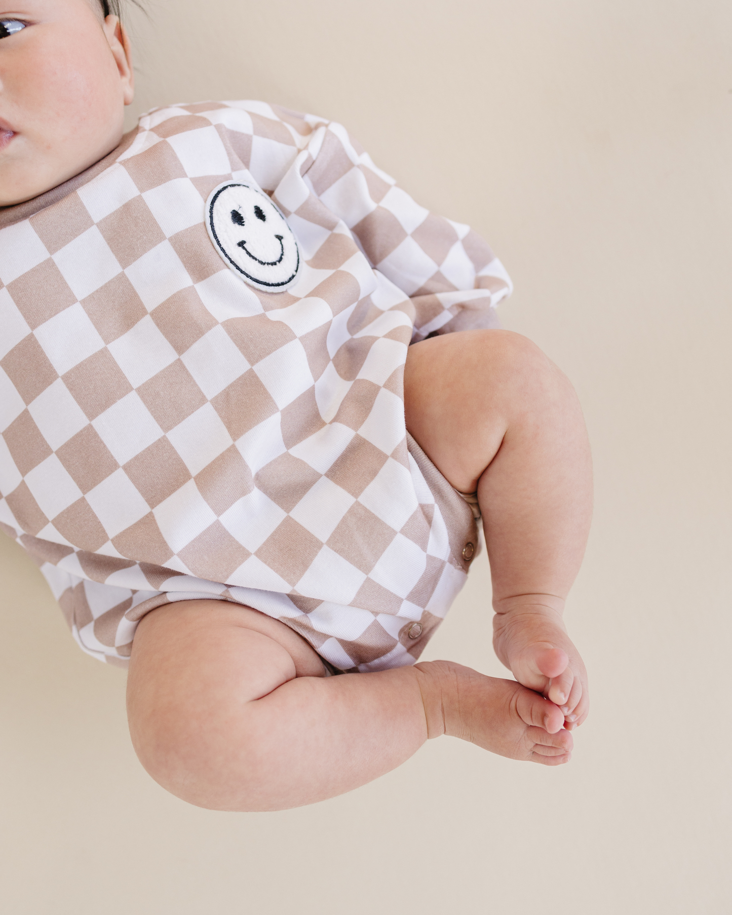 bubble romper // checkered smiley latte