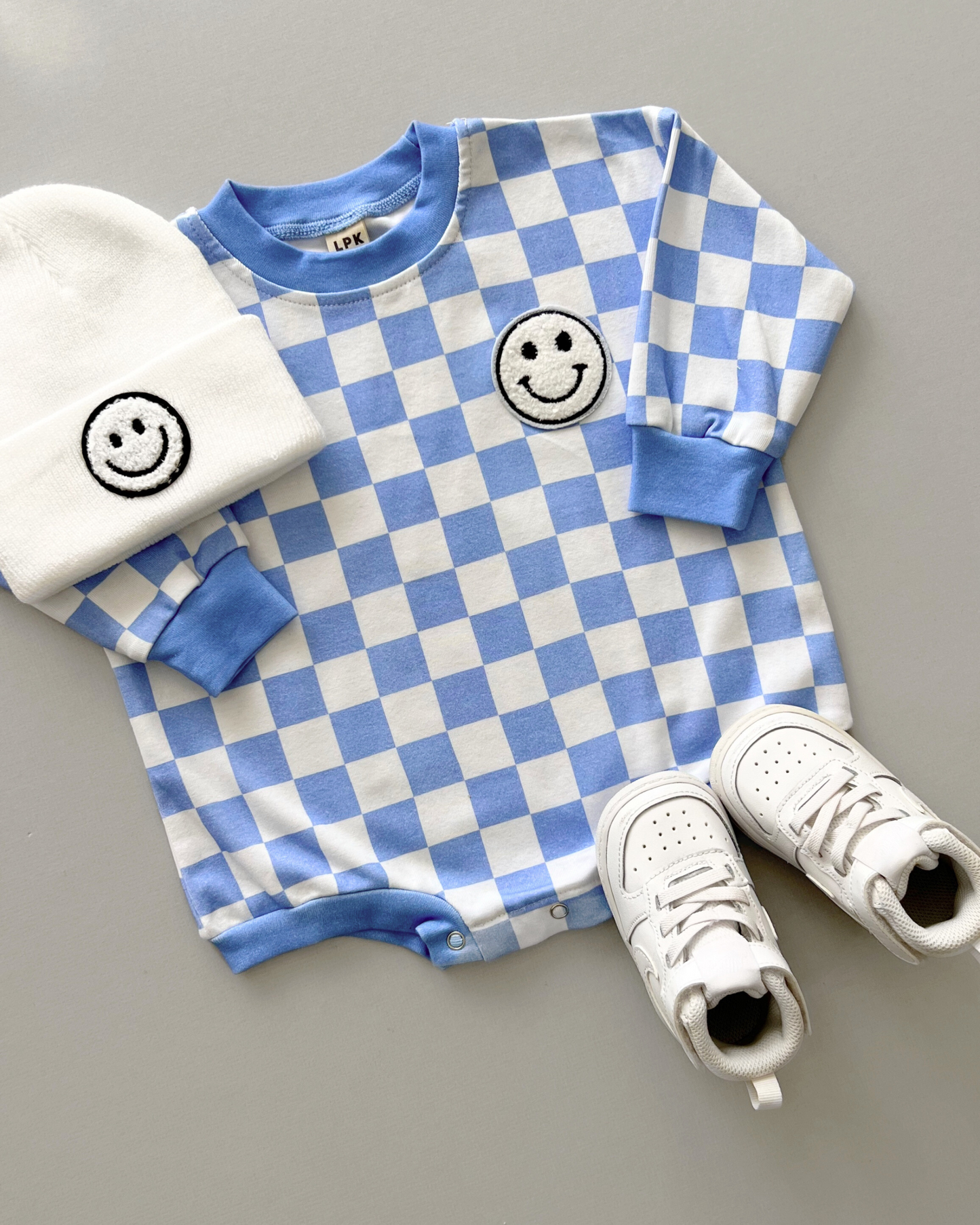 bubble romper // checkered smiley blue