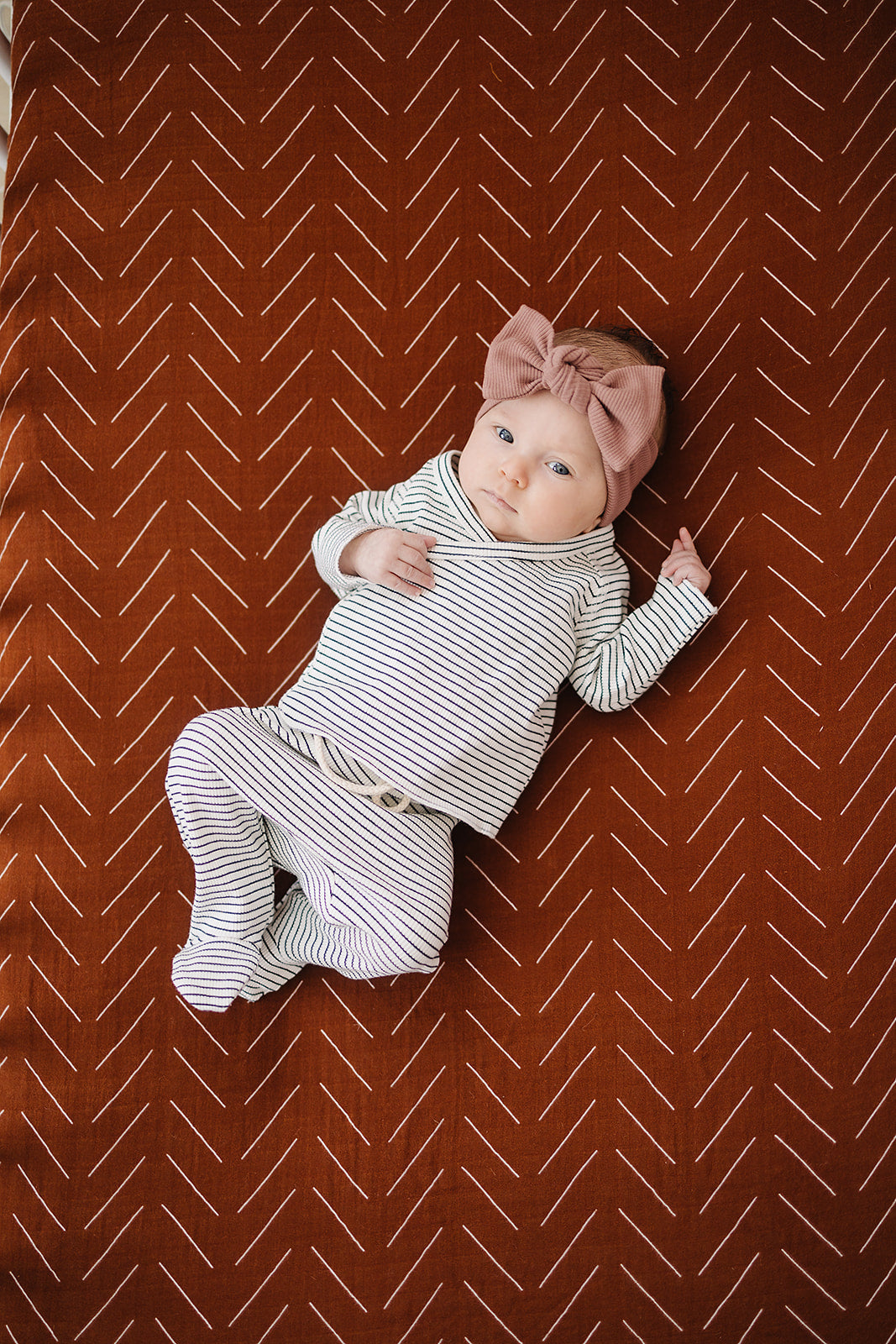 muslin crib sheet // rust mudcloth