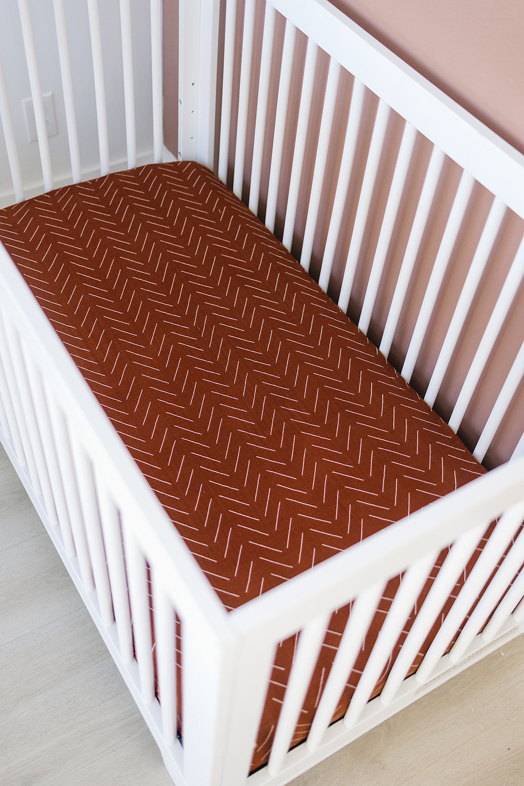 muslin crib sheet // rust mudcloth