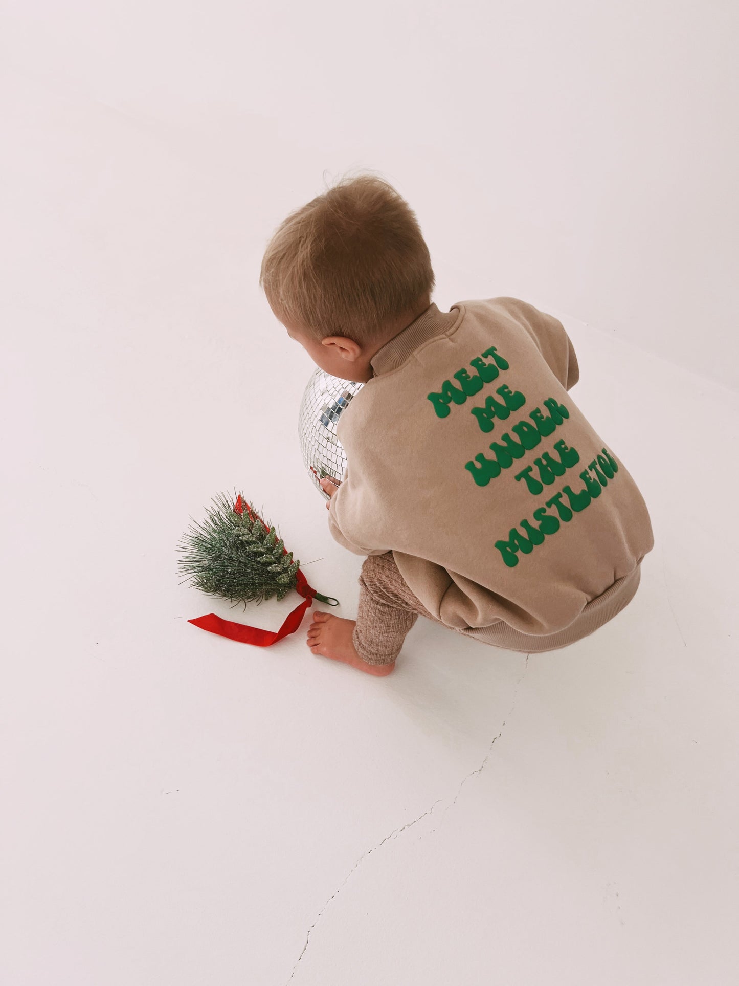 meet me under the mistletoe sweatshirt (baby through adult)