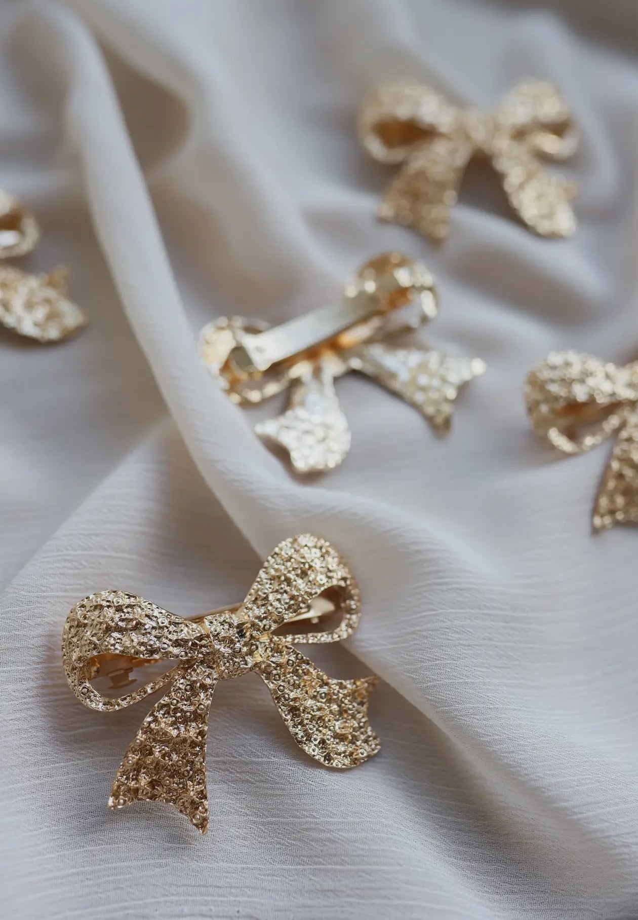 textured gold bow barrette